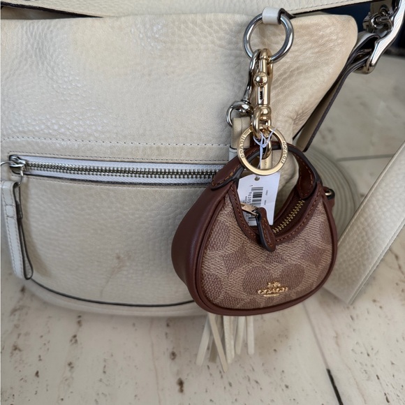 Coach Handbags - NWT Coach leather Monogram Mini Keychain/Charm Coin Bag